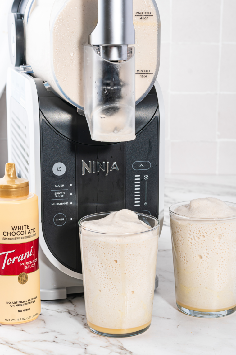 Layering toffee bits and caramel drizzle into a copycat Caramel Crunch Frosty Fusion