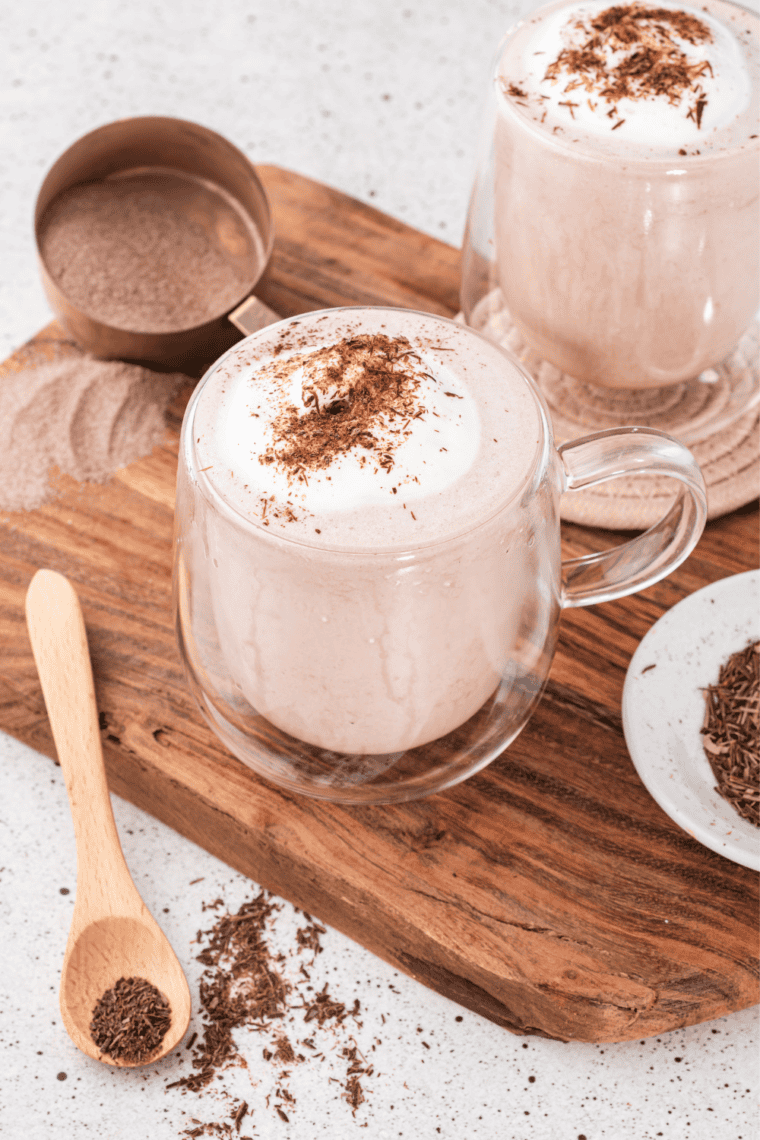 Copycat Wendy's Frosty-ccino in a tall glass topped with whipped cream and chocolate drizzle