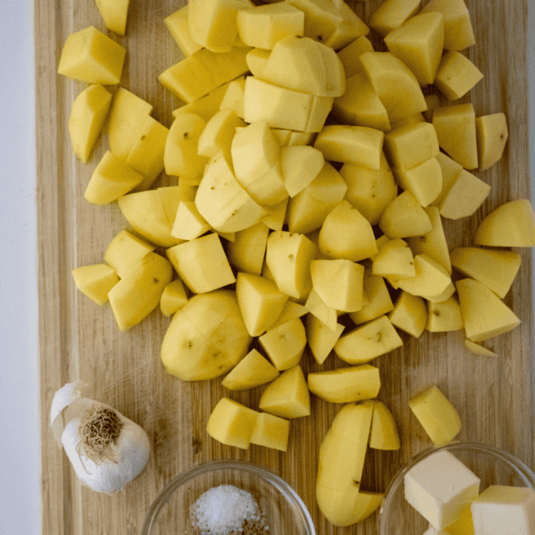 Cutting red potatoes into 3/4-inch cubes with the skin on for Denny's home fries