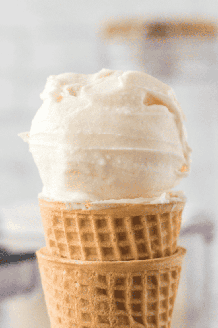Two scoops of Ninja Creami vanilla ice cream in a waffle cone