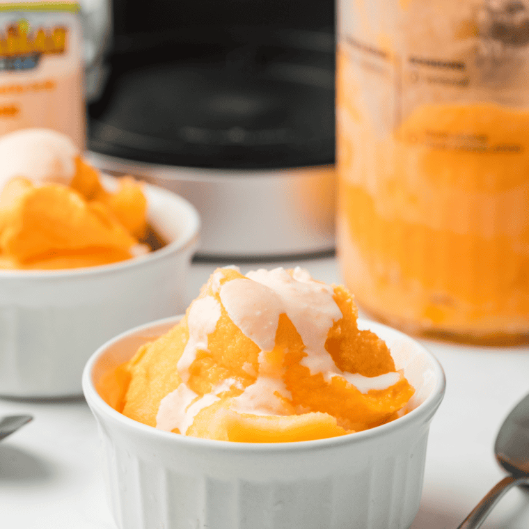 Bowl of orange Italian ice made in the Ninja Creami