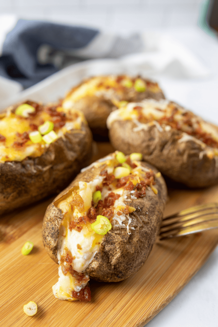 Fluffed potato interior with butter melting into the hot flesh