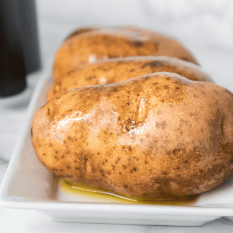 Russet potato rubbed with oil and coated in coarse kosher salt