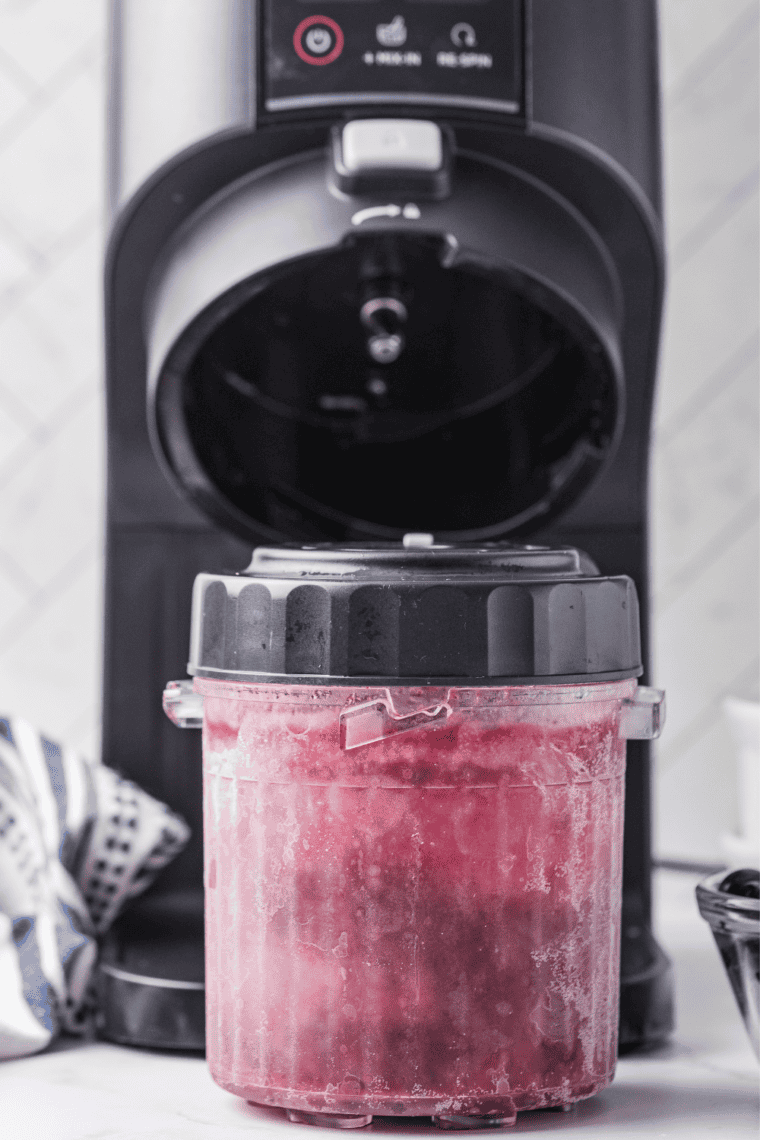 Frozen pint locked into the Ninja Creami with LITE ICE CREAM selected