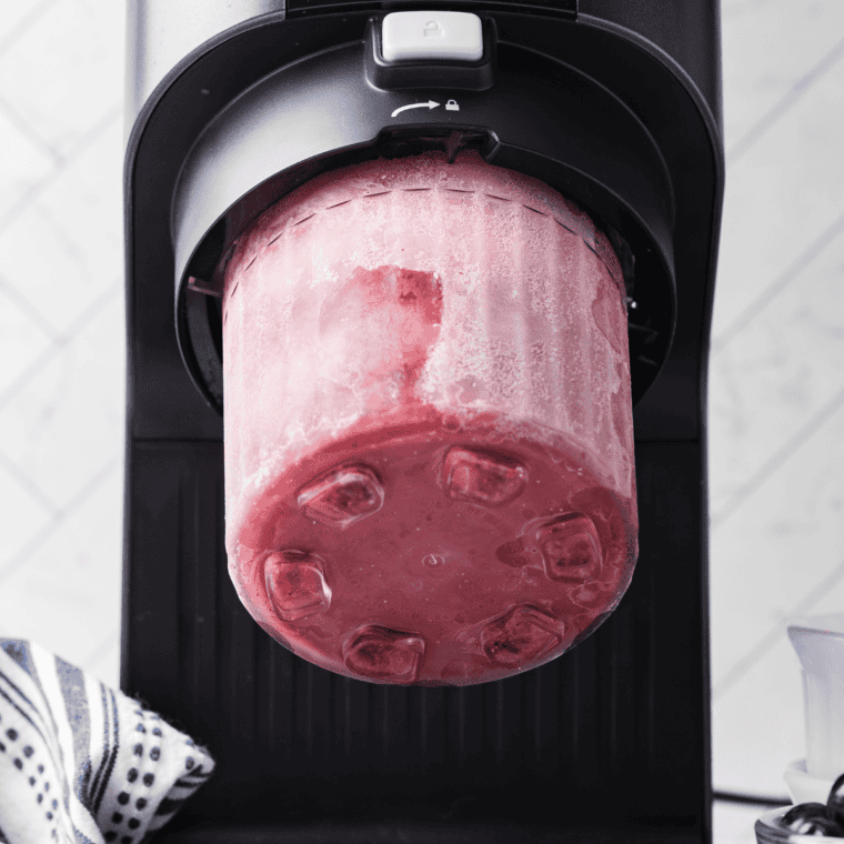 Creamy blueberry lemon ice cream in the pint after adding milk and re-spinning