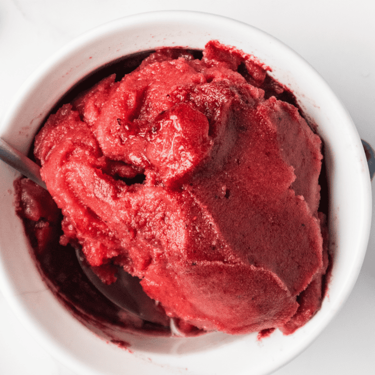 Close-up of the spun pint showing smooth blueberry lemon ice cream