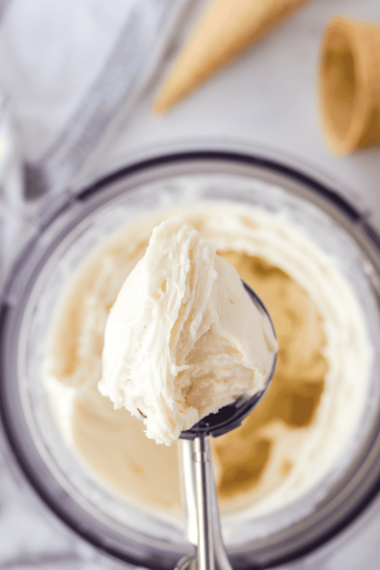 Scoop of Ninja Creami cheesecake frozen yogurt in a white bowl