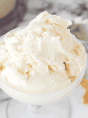 Scoops of Ninja Creami cheesecake ice cream in a glass bowl