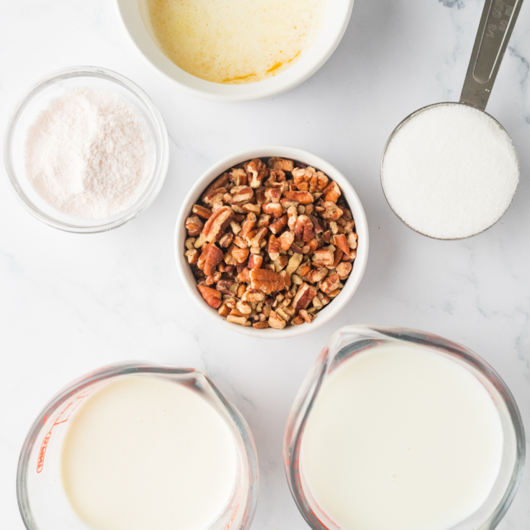 Ingredients for Ninja Creami butter pecan ice cream: milk, cream, brown sugar, butter, and pecans