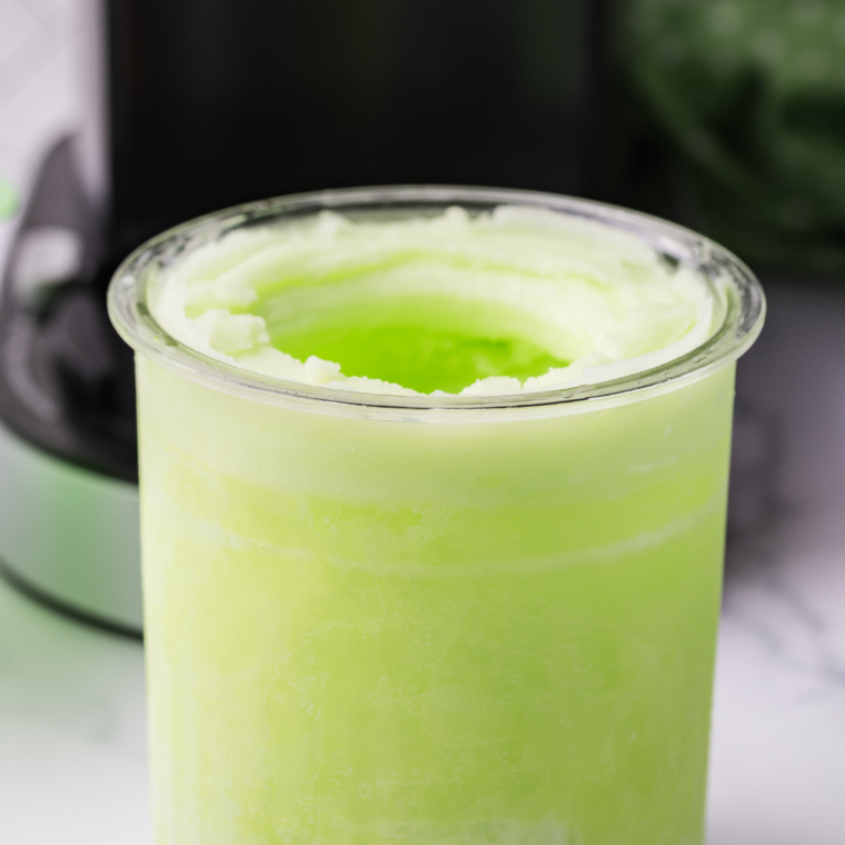 Crumbly spun lime Italian ice in the pint with a tablespoon of water added before re-spinning