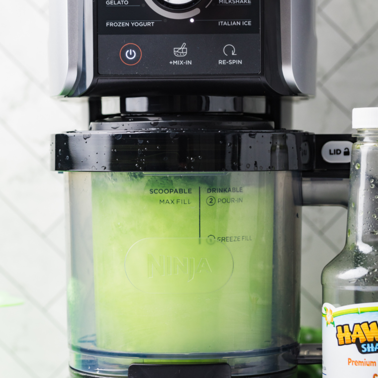 Locking the frozen lime pint into the Ninja Creami outer bowl and selecting Italian Ice
