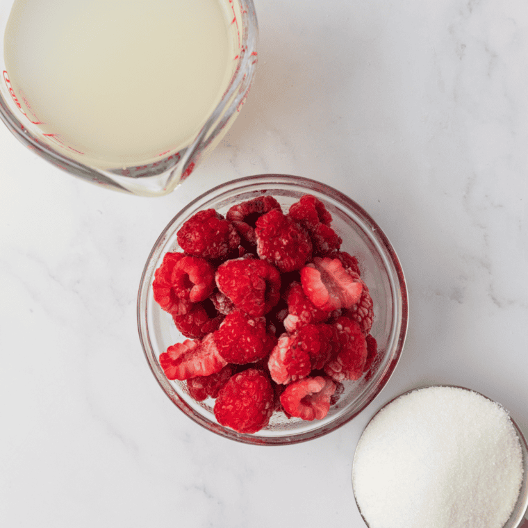 Ninja Creami raspberry lemonade sorbet ingredients: fresh raspberries, sugar, and lemonade