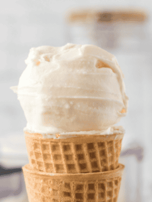 Homemade Ninja Creami ice cream scooped into a waffle cone