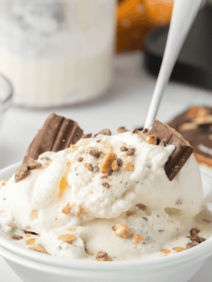 Two bowls of smooth homemade Ninja Creami ice cream topped with chocolate shavings