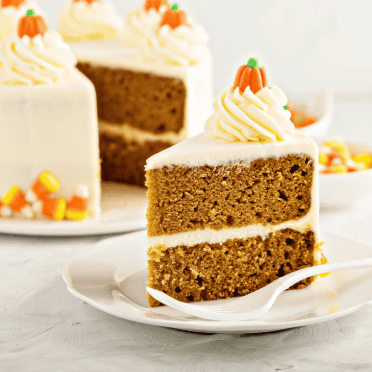 Frosted cake made in the Ninja Crispi, cut to show a soft crumb