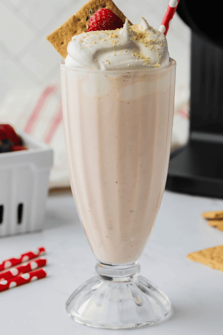 Strawberry milkshake thickening on the auger inside the Ninja Slushi vessel