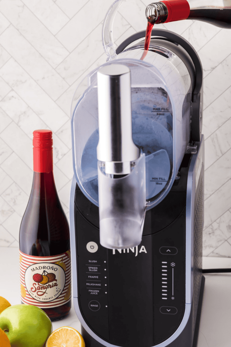 Ninja Slushi vessel filled with pale pink frozen rosé