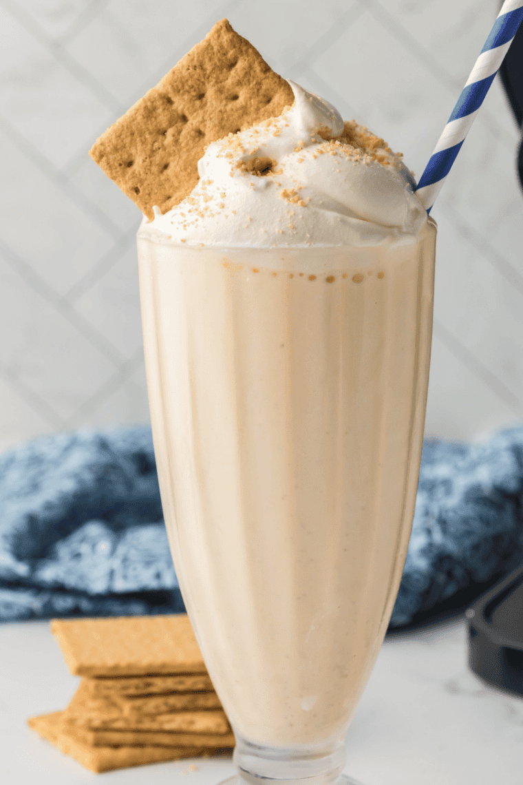 Ninja Slushi vanilla milkshake recipe with no ice cream, topped with whipped cream