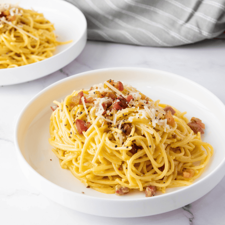 Old Spaghetti Factory mizithra browned butter spaghetti copycat on a white plate