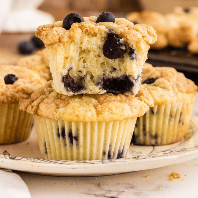 Split Perkins Mammoth Muffin showing tender crumb and whole blueberries