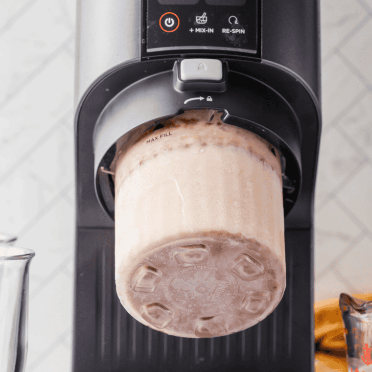 Frozen pint locked into the Ninja Creami set to Lite Ice Cream