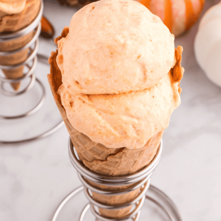 Scoop of high-protein pumpkin cottage cheese ice cream in a small dish
