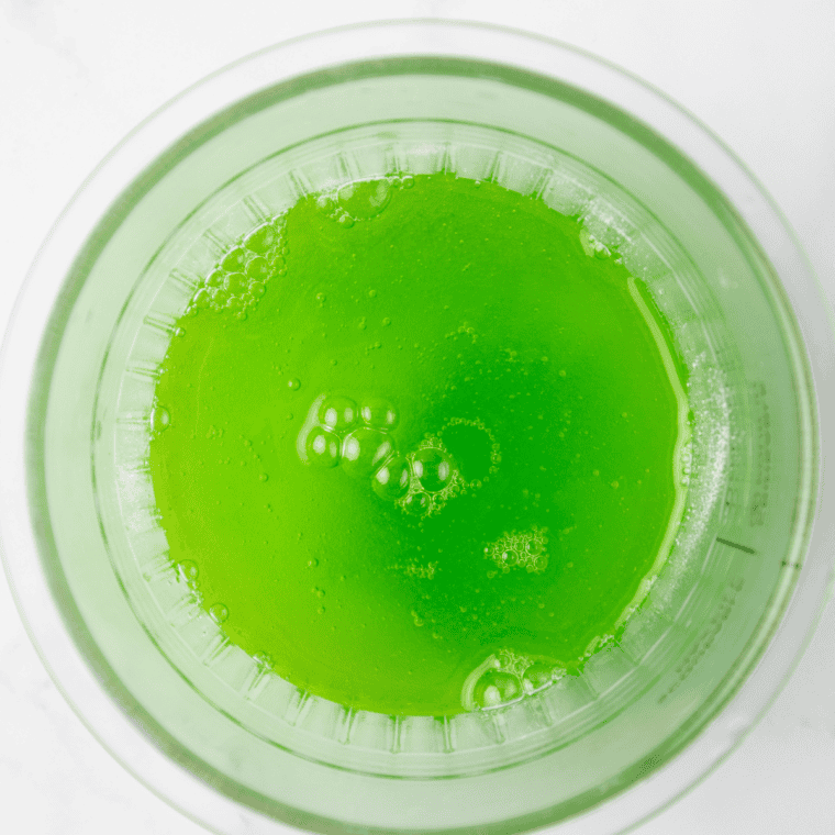 Water, allulose, fresh lemons, and xanthan gum on a counter