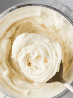 Half-pint serving of high-protein Ninja Creami ice cream in a small bowl with a spoon