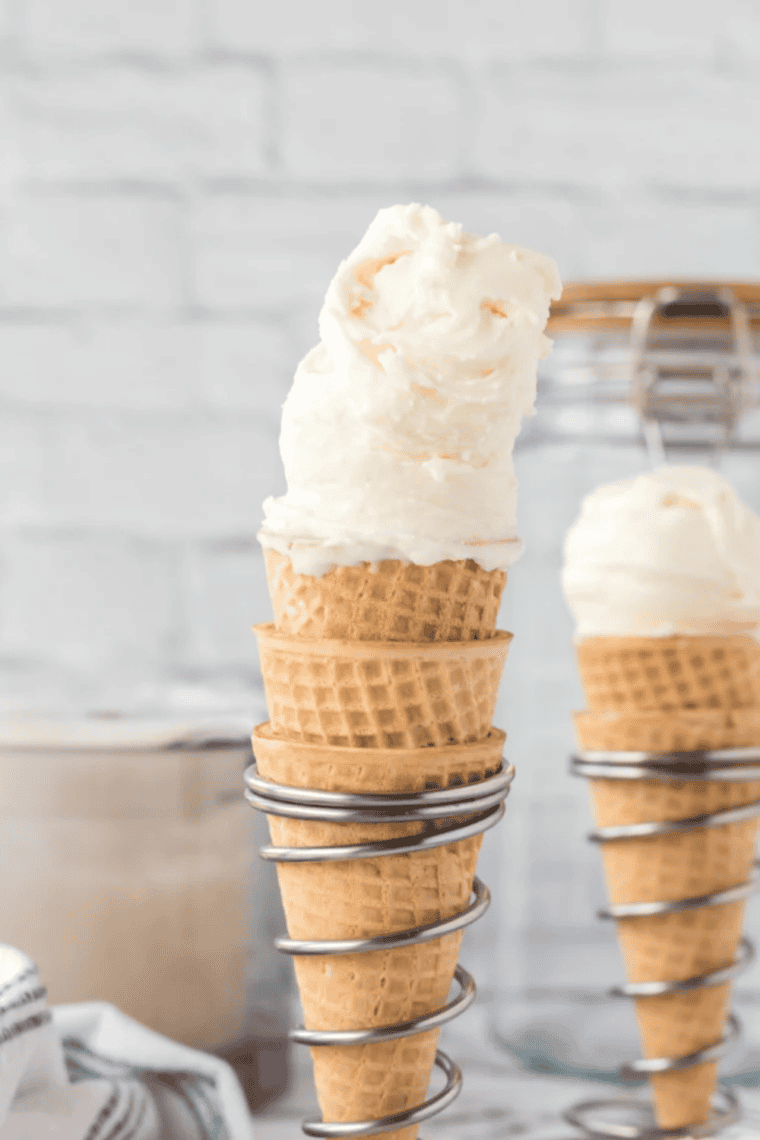 Cottage cheese ice cream in the Ninja Creami, scooped into a bowl with a spoon