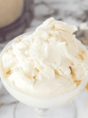 Scoops of smooth cottage cheese ice cream made in the Ninja Creami in a white bowl