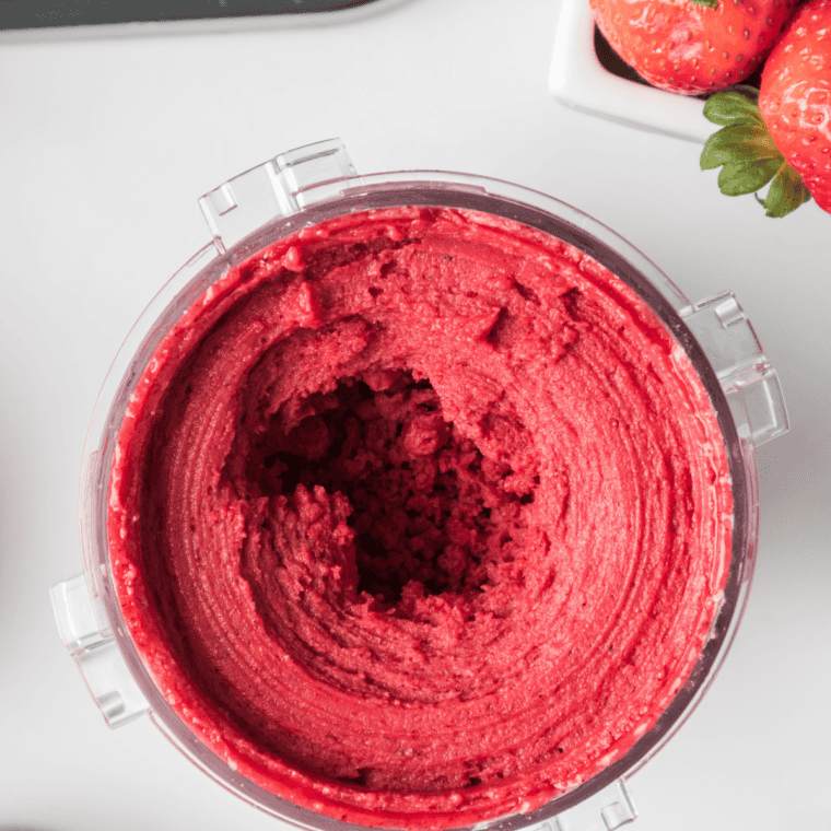 Ninja Creami fruit juice sorbet scooped into a bowl, bright and icy like Italian ice