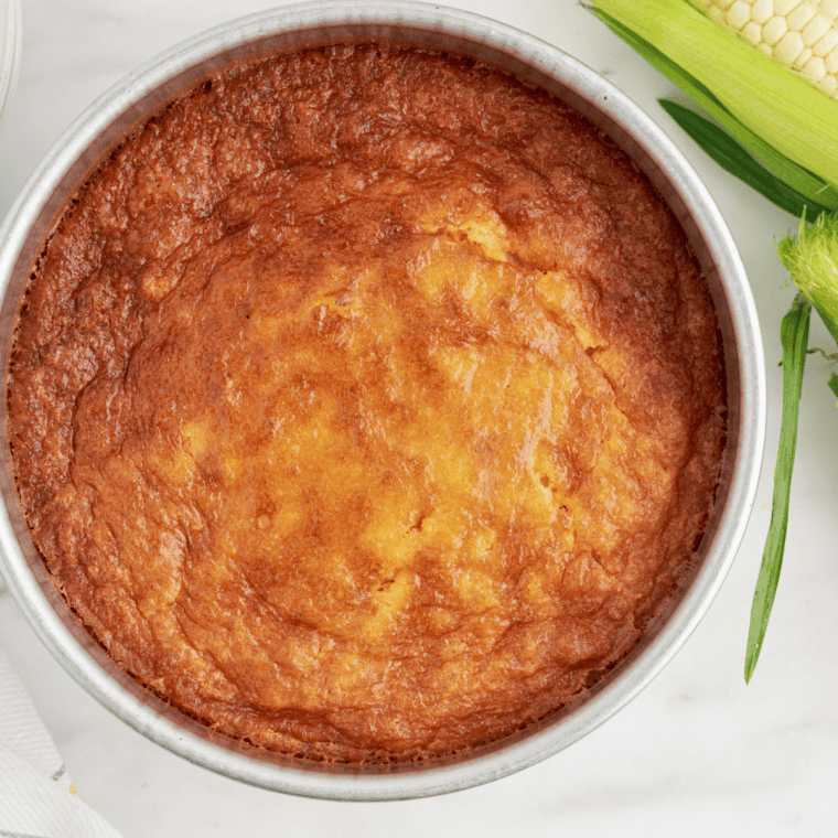 Baked 12 Bones-style corn pudding in a 9x13 pan with a golden brown top