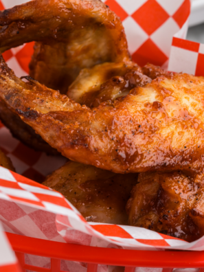 Air fryer Buc-ee's BBQ wings glazed in sweet smoky sauce on a platter