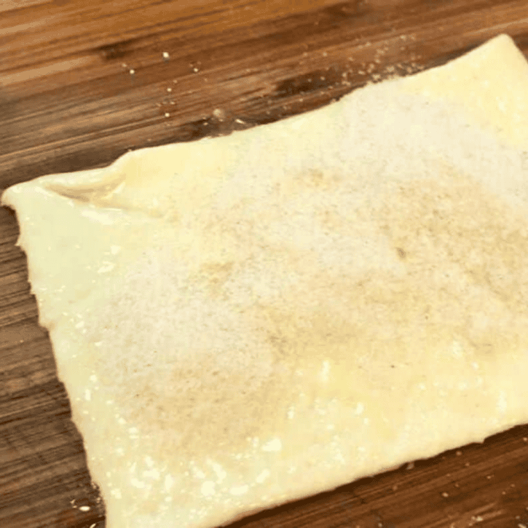 Ingredients for Buc-ee's Beaver Tail recipe: crescent dough sheets, brown sugar, cinnamon, butter, powdered sugar, milk, and vanilla