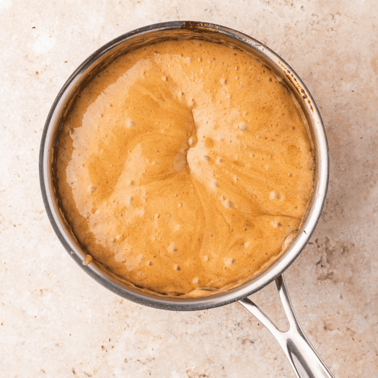 Caramel foaming after adding baking soda and vanilla extract