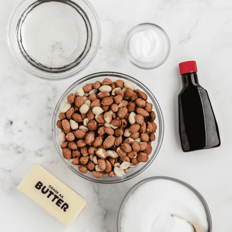 Ingredients for Buc-ee's pecan pralines including brown sugar, granulated sugar, heavy cream, butter, vanilla, and pecan halves