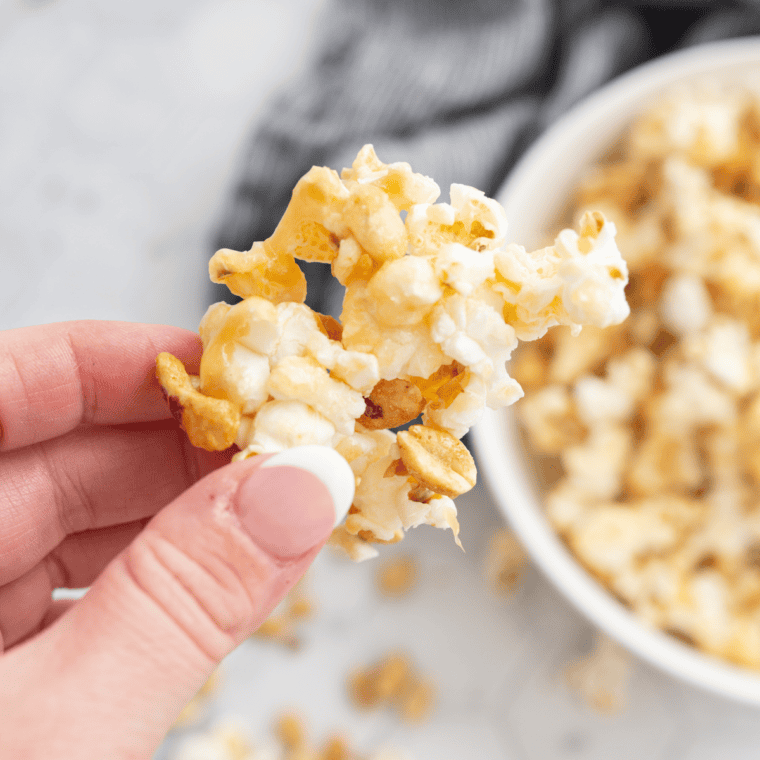 Bowl of homemade Buc-ee's popcorn on a coffee table ready for family movie night