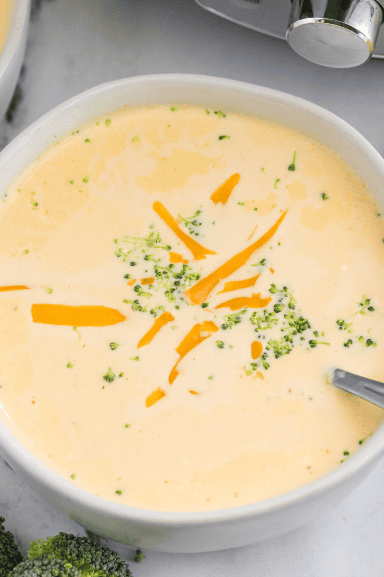 Broccoli cheese soup served in a sourdough bread bowl