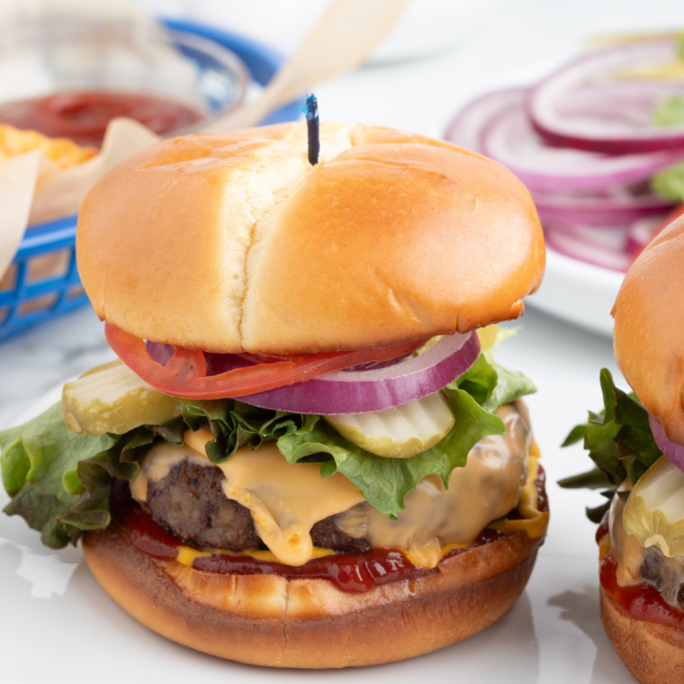 Close-up of a Steak 'n Shake butter burger with melted butter soaking into the bun