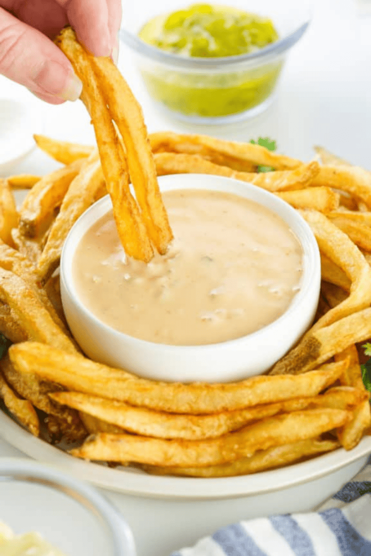 Finished Denny's Diner Q sauce tasted and seasoned in a bowl, ready to cover and chill