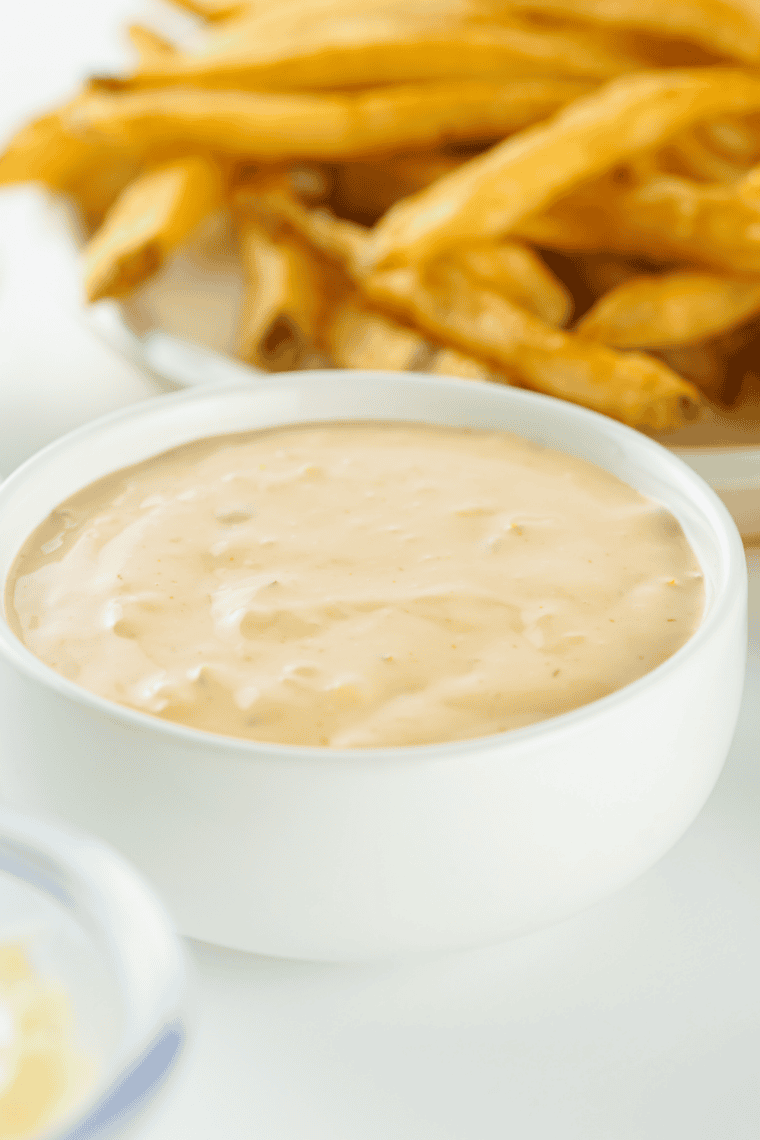 Close-up of thick, creamy Diner Q burger sauce in a small bowl