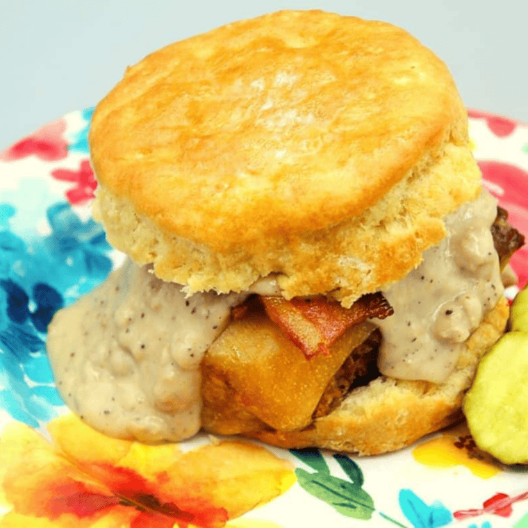 Denny's sausage gravy and biscuits copycat with creamy peppery sausage gravy over split buttermilk biscuits