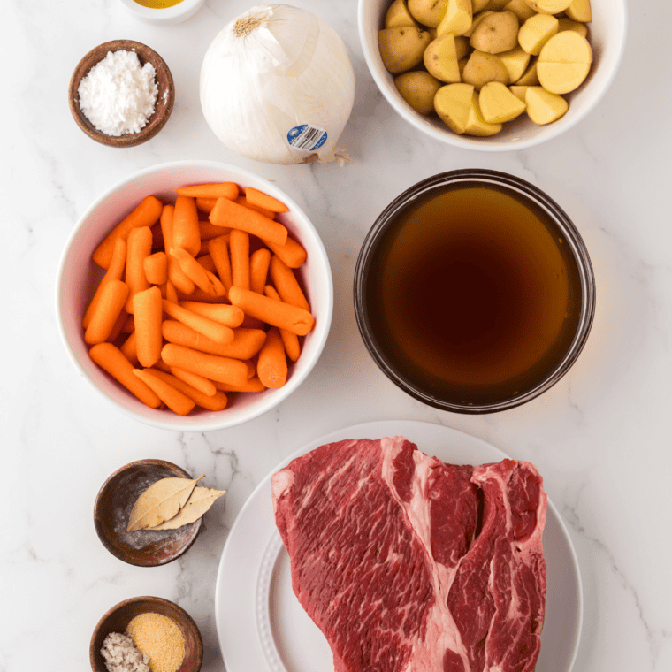 Ingredients for Denny's copycat pot roast bowl: chuck roast, red potatoes, carrots, celery, onion, broth and herbs