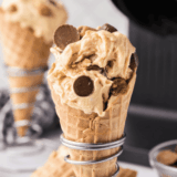 Bowl of homemade Ninja Creami Reese's Peanut Butter Cup ice cream with chunks of Reese's peanut butter cups on top