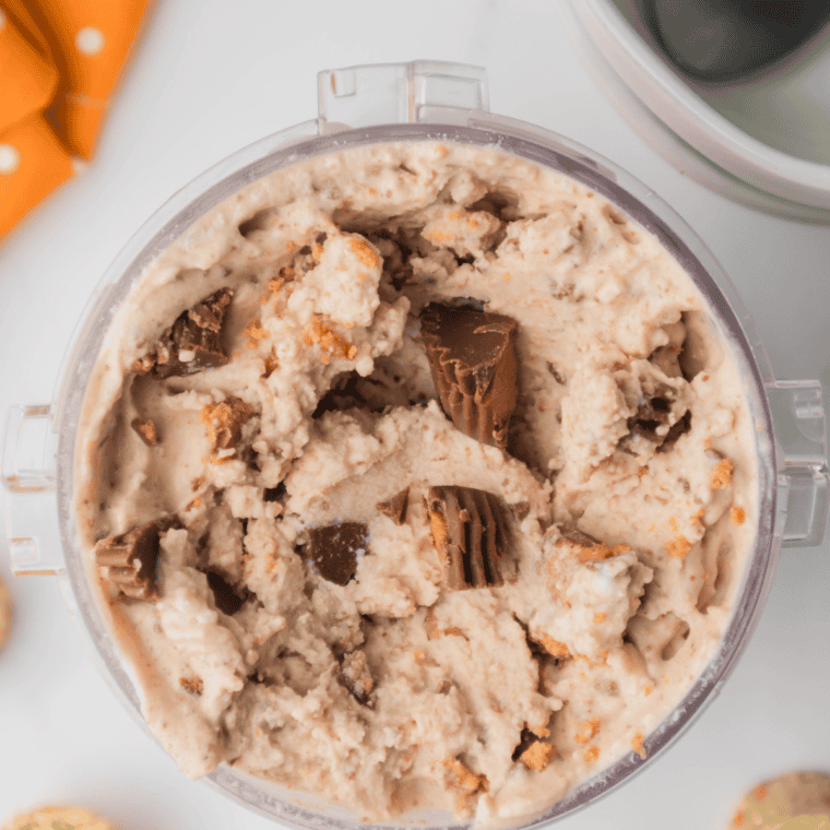 Chopped Reese's Peanut Butter Cups added to the center of the Ninja Creami pint before running the Mix-In function