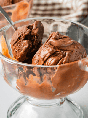 Bowl of Ninja Creami World Class Chocolate ice cream with milk chocolate scoops and a white chocolate mousse swirl