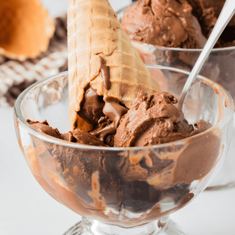 Bowl of Ninja Creami World Class Chocolate ice cream with milk chocolate scoops and a white chocolate mousse swirl