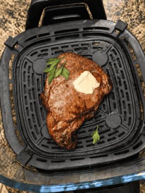 Medium-rare ribeye steak sliced after cooking on Max Crisp in the Ninja Crispi