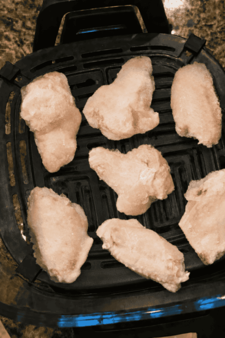 Frozen chicken wings cooked crispy on Max Crisp in the Ninja Crispi 4-quart container