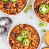 There's a reason this Pioneer Woman chili recipe shows up on so many dinner tables once the weather turns. It's the kind of chili that doesn't try to be clever: ground beef, a big handful of chili powder, tomatoes, beans, and a slow simmer that pulls everything together. The result is thick enough to hold a spoon upright, rich without being greasy, and mild enough that the whole family can dig in.